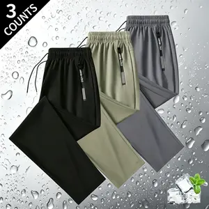 3-pack men’s cool ice silk sports pants—elastic and breathable, featuring a drawstring waistband and zippered pockets—perfect for everyday wear and sports.