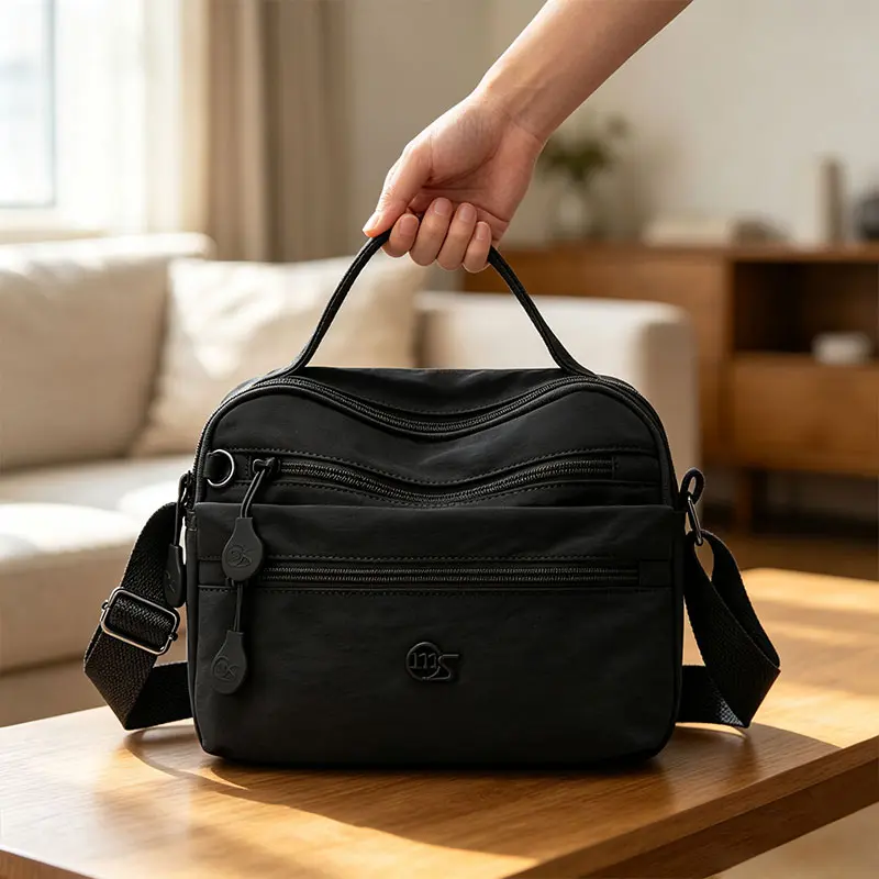 lightweight shoulder bag, wide adjustable strap bag, large capacity shoulder purse, multi compartment crossbody, portable mini handbag, multi pocket daily bag, soft nylon handbag, roomy sling purse
