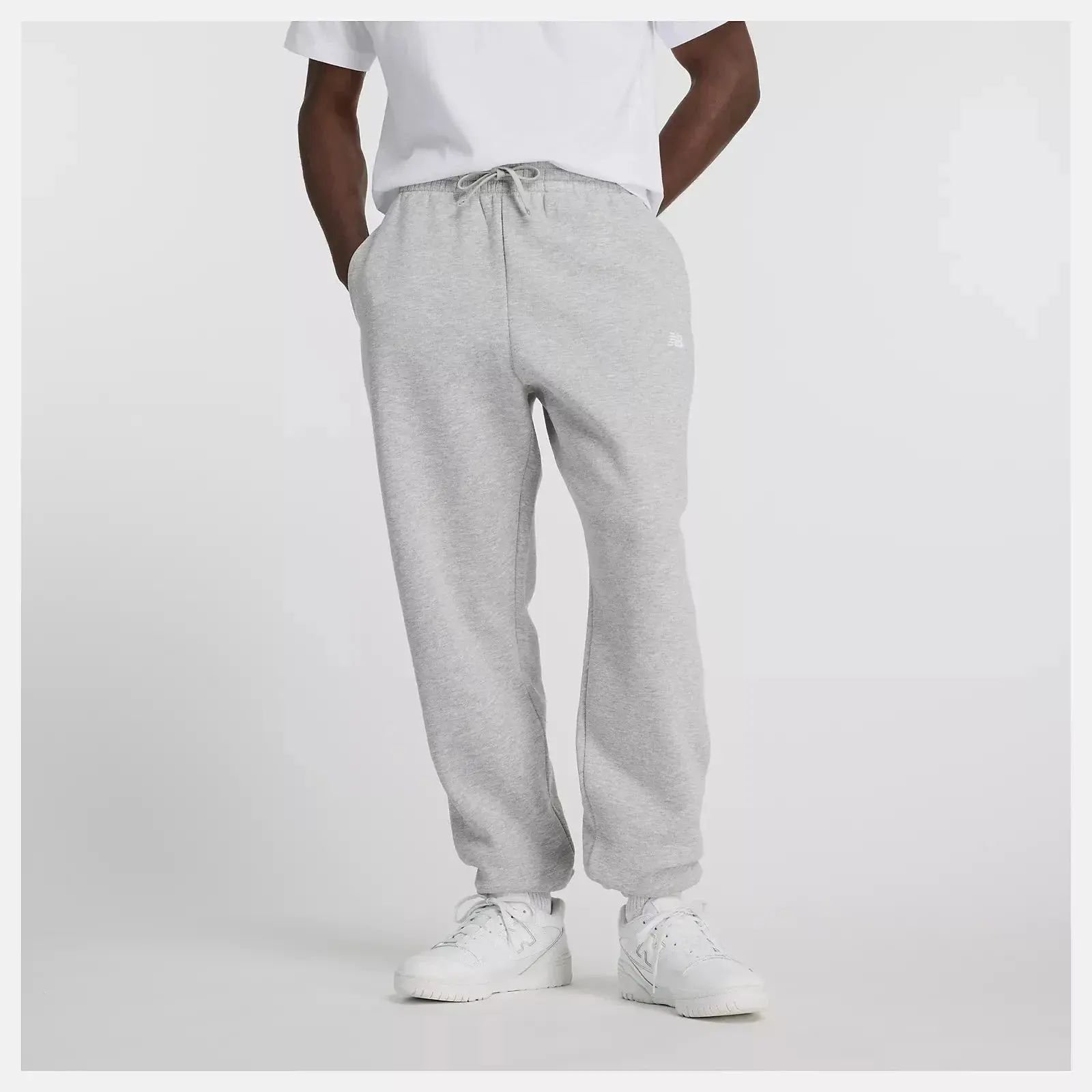 New Balance Sport Essentials Joggers Tapered Leg Pants in Gray Fleece | Men's