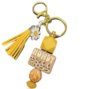 Howdy Yall Keychain with Yellow Tassel Daisy Charm and Leopard Print Design