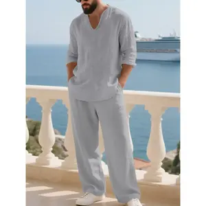 Men’s linen set featuring a long-sleeve V-neck shirt and pants; casual loose fit for beach vacations; spring/fall fashion; comfortable wear