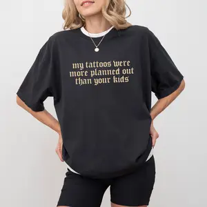 Women's Cotton Casual Fit Streetwear Top - Retro Gothic Graphic Printed Tee, Funny "My Tattoos Were More Planned Out Than Your Kids" Gift for Ink Enthusiasts