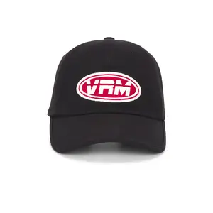 VERUTUM Initial Cap in Black