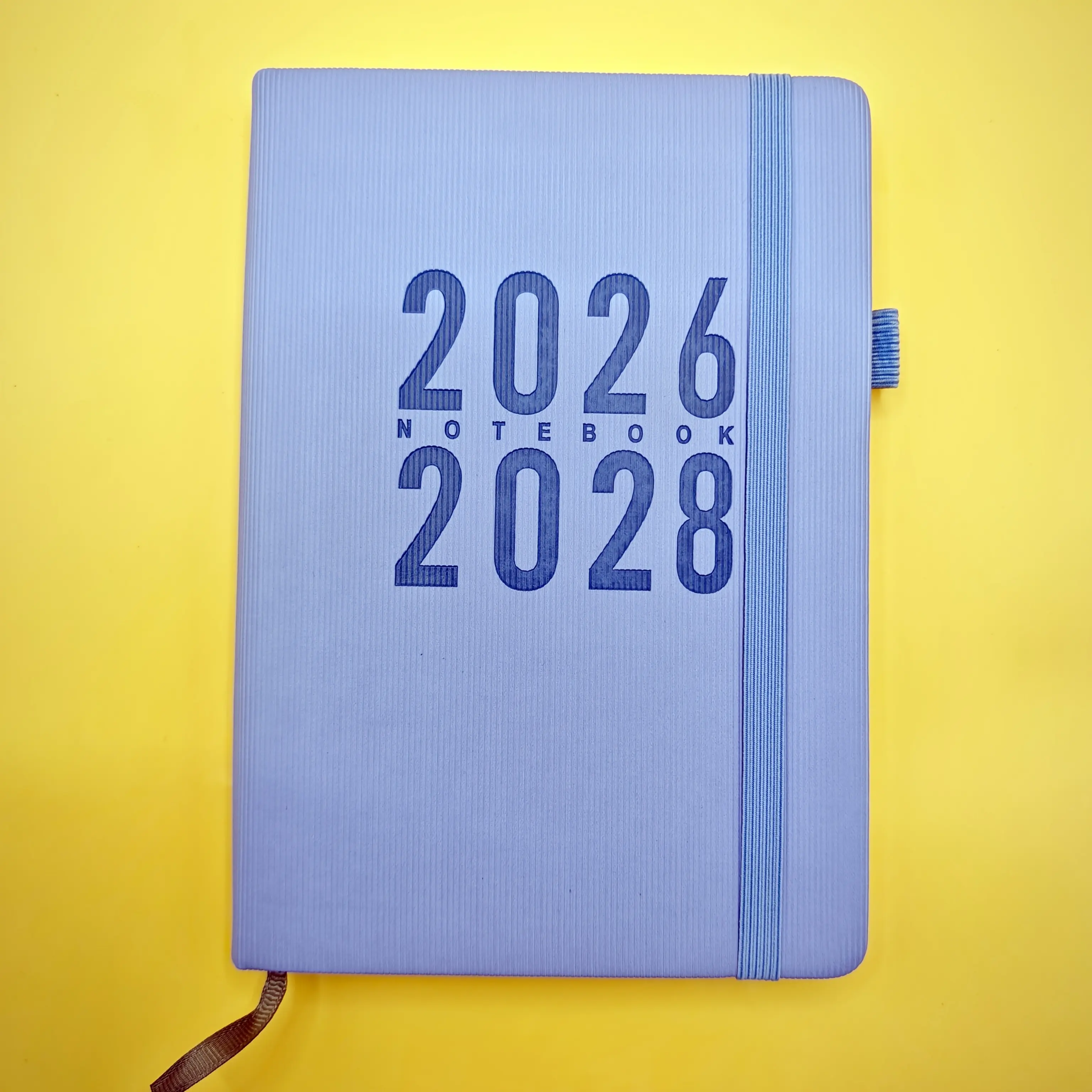 Available in three colors, the Ben 2026–2028 3-year planner notebook features a soft cover, an elastic pen sleeve, a monthly view for all 12 months, an English version, and a minimalist design suitable for adults who value organization.