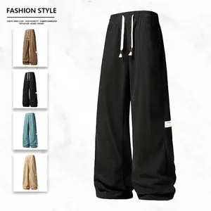 Waxed corduroy wide-leg pants, trendy street style, drawstring design, unisex, suitable for everyday outings and casual commutes