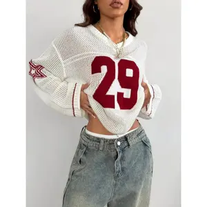 A Oversized Knitted Sweater with Striped And Number Prints, Featuring Long Sleeves.