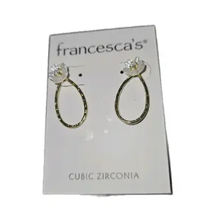 Cubic Zirconia Gold Color Earrings with Ivory Flower Design by Francesca's Boutique
