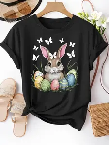 Women’s Easter Bunny Pattern T-Shirt – Soft pink short-sleeve T-shirt featuring a cute bunny and colorful egg design; casual, comfortable fit, spring fashion | Vintage pattern T-shirt | Glossy texture