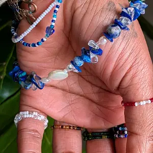 Òrìṣà Ṣango Elekẹ Stim Rings - ṢANGO Elekẹ Stim Rings - Oriṣa-Inspired Silverline Charlotte-Cut Beaded Stretchy Stim Rings with Unique Shape and Style, ṢANGO Jewelry For Modern Yorùbá Culture