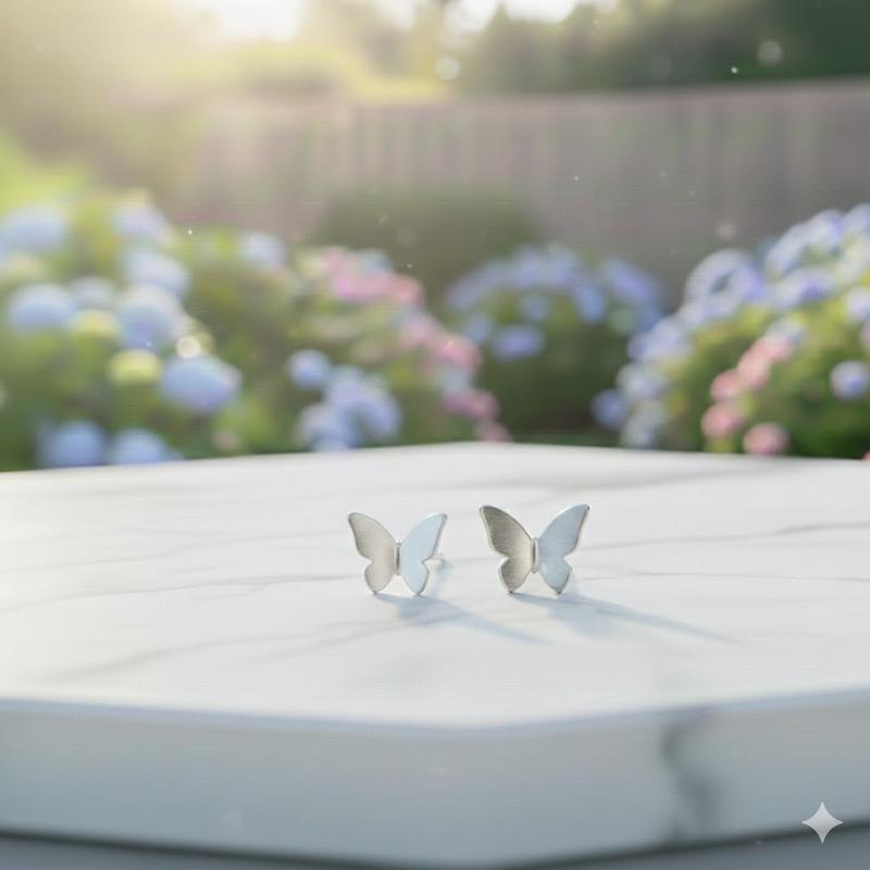 SunFeel The "Clean Girl" Essential: Minimalist Butterfly stud earrings for the ultimate effortless look. Upgrade your daily stack with these Copper Butterfly Studs. The perfect "Clean Girl" aesthetic.