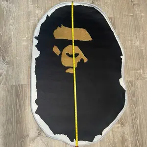 Tsunami Aape Big Head 3 Feet Rug - Black and Gold Design, Ideal for Living Room Decor