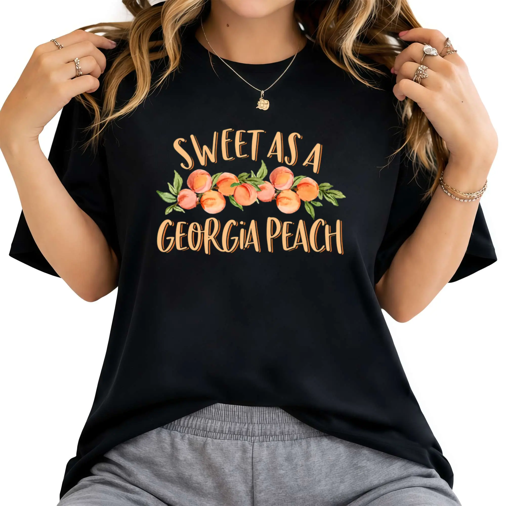 "Sweet as a Georgia Peach" — Cute & Playful Southern Georgia Girl T-Shirt | Unisex Short-Sleeve Pure Cotton Top | Soft & Breathable | Black Crew Neck Casual Wear | Humorous Apparel | Statement Tee | Comfortable Fabric