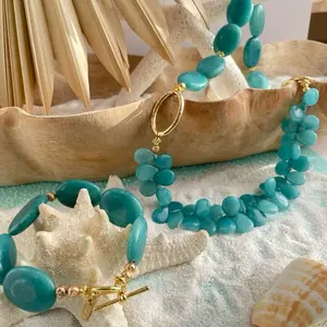 Conjunto “Cielo de Fuego” collar y pulsera de ágatas azul celeste.