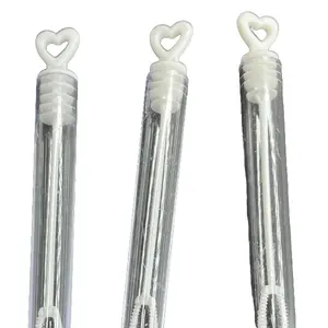 Single empty white bubble wand charm that can go on a bracelet or keychain or necklace