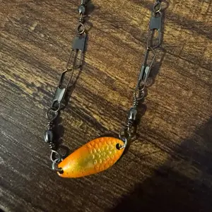 Swivel barrel bracelet with pendant