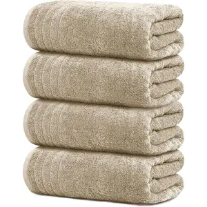 A pack of 4 extra large bath towels, 30 x 60 inches, 100% cotton, lighter weight, quicker to dry, super soft and absorbent, perfect for the bathroom, in blue.