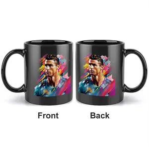 1pc 11oz black ceramic mug featuring a low polygonal style portrait of Cristiano Ronaldo, with a geometric block pattern and high saturation splatter design on both sides, making it a double-sided printed football sports art gift cup.