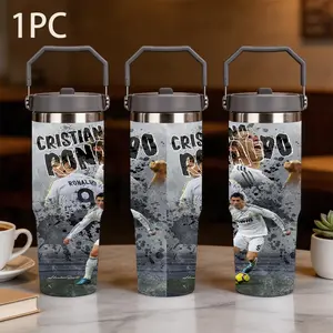 1pc 30oz portable thermos cup Tumbler featuring a collage of classic moments of CRISTIANO RONALDO. Adorned with the signature of "CRISTIANO RONALDO" in bold letters, it is both exciting and collectible for fans of Cristiano Ronaldo