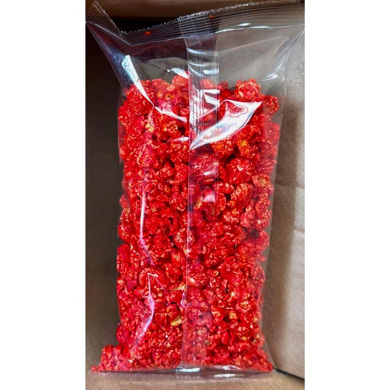 Junior Snacks Co. Hot Cheddar Popcorn; Yellow Cheddar meets our Spicy Red Seasoning