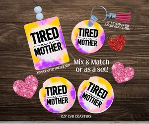 Tired As A Mother 5pc Car Interior Accessory Gift Set with Car Air Freshener, Keychain, 2" Round Backpack Tag & Ceramic 2.5" Car Coasters