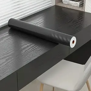 A roll of black wood grain stickers, waterproof and oil-proof vinyl film, suitable for kitchen, bathroom, walls, furniture renovation, easy to paste and remove, modern hollow pattern, semi-gloss, self-adhesive, reusable PVC material