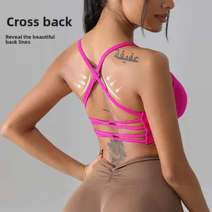 Boring sports bras that only work at the gym? This hot pink crisscross-back one shows your back lines, supports light lifts/yoga and slays under jackets (athleisure win)