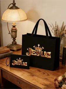 Jesus-themed black canvas tote and makeup bag set. Linen large-capacity bag with sparkling crown and Jesus prints, perfect for Christian events and daily storage.