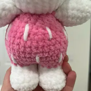 Hand crocheted strawberry puppy