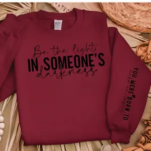 “Be the light in someone’s darkness” sweater Long Sleeve Clothing