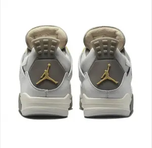 Retro Mid-Top Athletic Shoes in Light Grey Leather and Suede Upper with Beige Lace Locks, Dark Grey Midsole, and Visible Air Unit