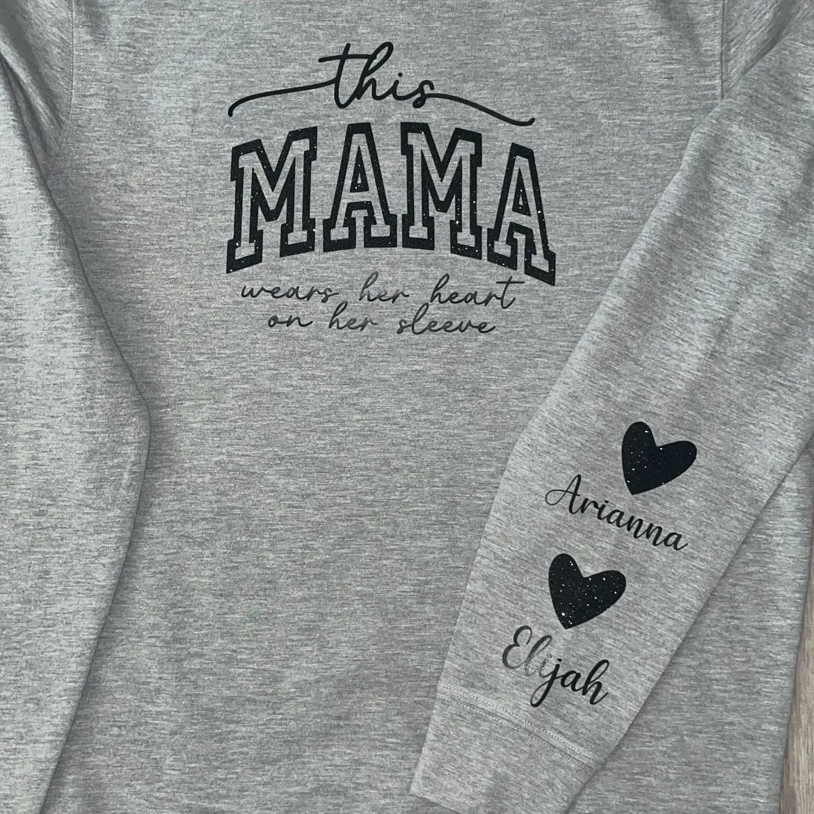 This mama wears her heart on her sleeve, lightweight sweater