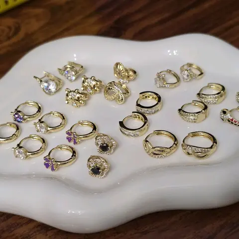 "Variety of small earrings for girls and women – high-quality gold-plated finish."