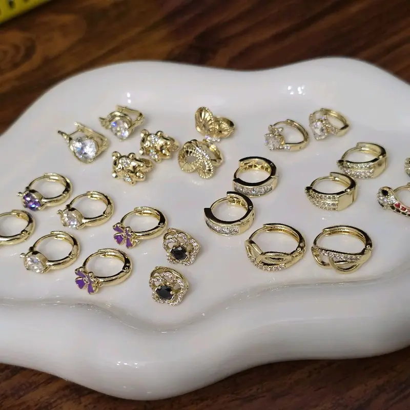 "Variety of small earrings for girls and women – high-quality gold-plated finish."