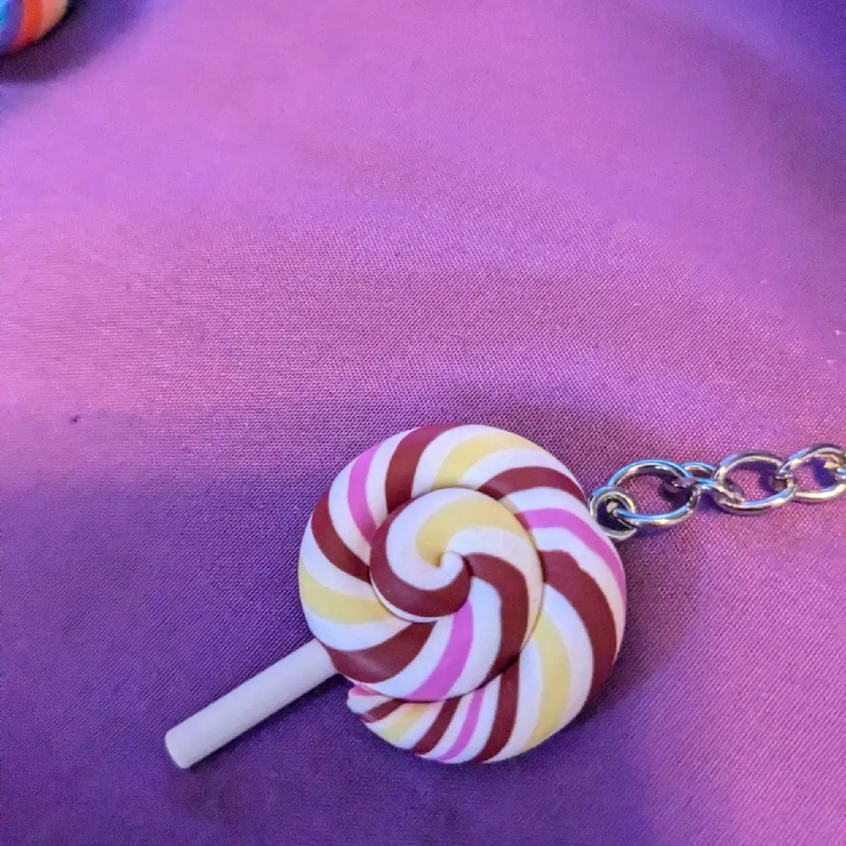 Purple & yellow lollypop candy keychain