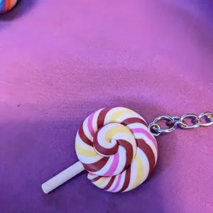 Purple & yellow lollypop candy keychain