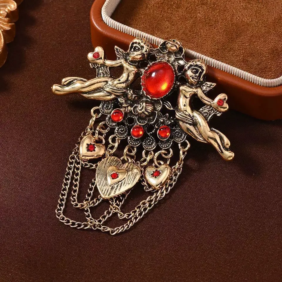 Red Cupid brooch