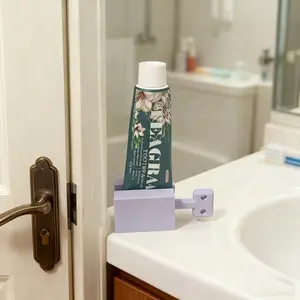 Portable Toothpaste Squeezer Roller Compact Convenient Travel Solution Reduces Waste Organizes Countertops Easy Squeeze Dispenser for Soft Tube Packaging Products