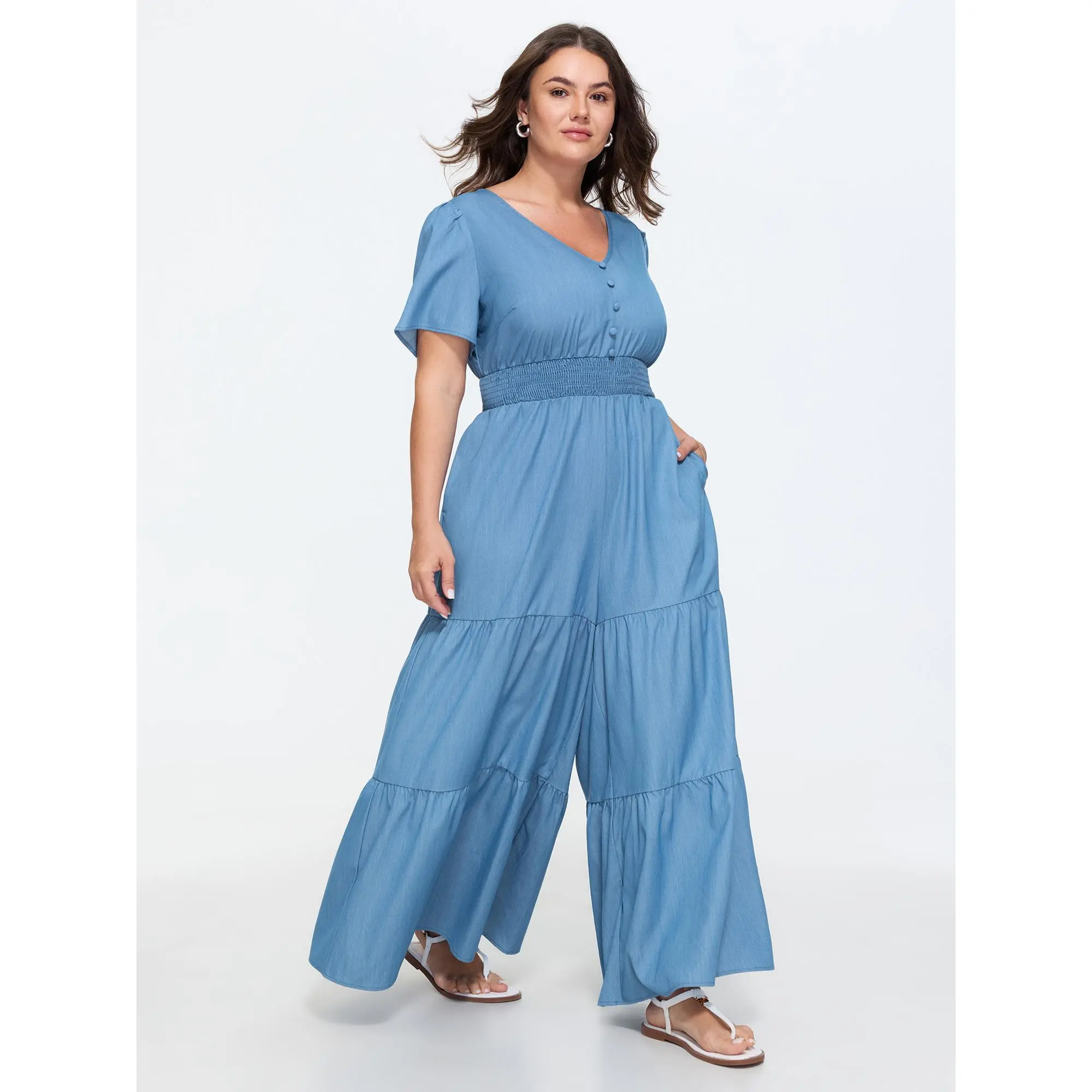 BLOOMCHIC Women's Plus Size Smooth Smocked Waist Faux Denim Spandex Jumpsuit - Button Detail, Stylish Fit, M-6X Sizes, 2026 Summer Deals, Solid Style Finds, Comfortable, Polyester, Rayon, Fitted, Fabric, Overalls, Casual, Pockets, Tiered, Basic, Polyester