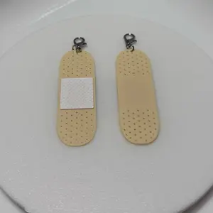 Bandaid Badge Keychain (2pc)