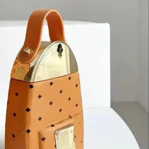 Golden Backpack Spray Bottle Sturdy High-Quality Glass with Fine Mist Sprayer for Premium Application Perfect for Personal Use or Display