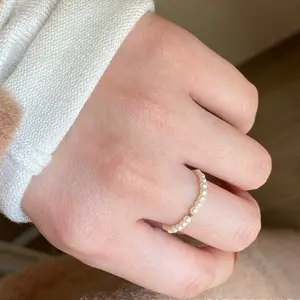 Mini Pearls Stretch Ring with 14k Gold Filled Bead