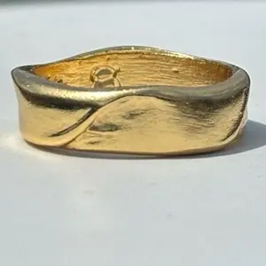 The 18k gold Sequence Ring by Strickly Boarding and Joe Paradise.  The undisputed leader in custom surf jewelry. Statement Ring made in the USA!