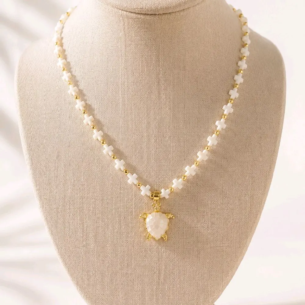 Sea Pearl Turtle Necklace  White Mother of Pearl Cross Beads & Gold Accents