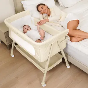 Baby crib for newborns, bedside sleeper bassinet with breathable mesh and mattress, easy to move with lockable wheels, 4 adjustable heights (beige)