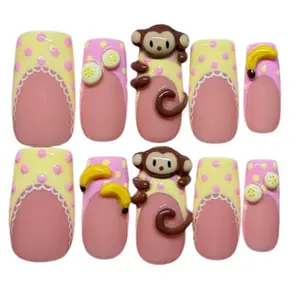 Banana Monkey Press-On Nails, 3D Monkey and Banana Charms, Pink and Yellow Polka Dot Base with Cute Details, Handmade Cartoon Nail Art Set, Playful Kawaii Style, Custom Design, Fun Gift for Her