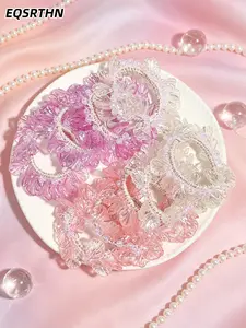 Gradient pink pearl petal hair tie! Exquisite glazed petals paired with delicate tiny pearls. The woven hair tie features high elasticity without tightening the head. Its pink-white gradient creates a soft halo texture, boasting an outstanding aesthetic w