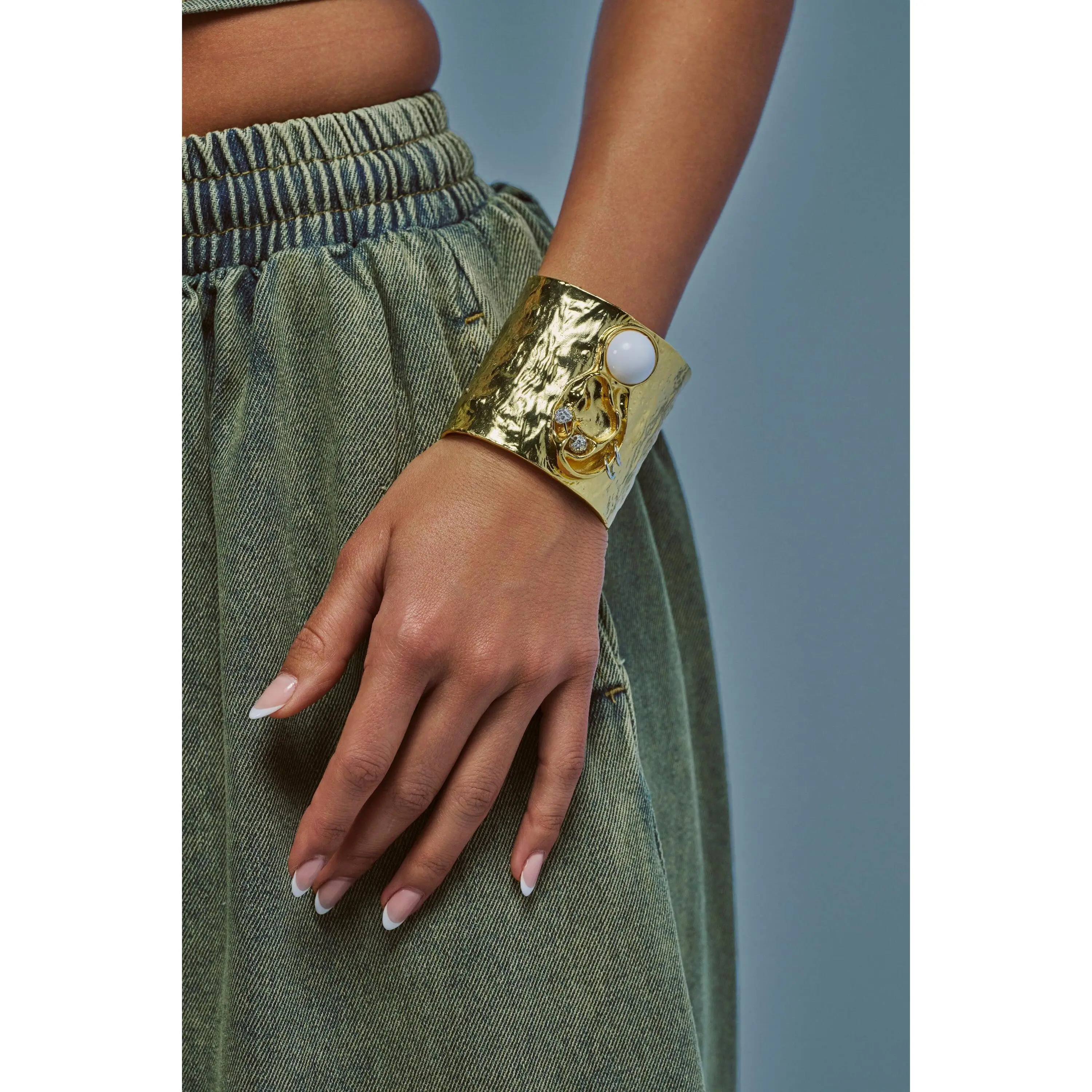 LISTEN CLOSELY METAL CUFF IN GOLD