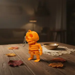 Tiny Pumpkin Skeleton Keychain