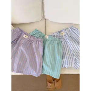Women’s high-waisted straight-leg shorts with striped print and letter patches; casual, comfortable elastic waistband for summer, built for quality and durability—fashionable women’s bottoms for everyday wear. GARMENTARY