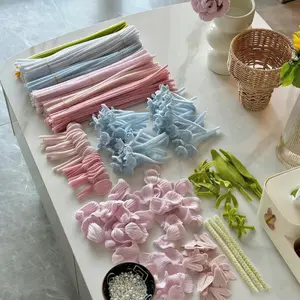 Pipe cleaner craft flower kit, including various bouquets, assorted color pipe cleaners in bulk, with stems, tape, pistils, and ribbons (pink and blue)